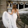FERNE-ML0435-V-NECKLINE-FRONT-AND-BACK-FITTED-CREPE-GOWN-WITH-BEADED-SECTIONS-AND-SHOULDER-BEAD-TASSLES-WEDDING-DRESS-MADI-LANE-BRIDAL8