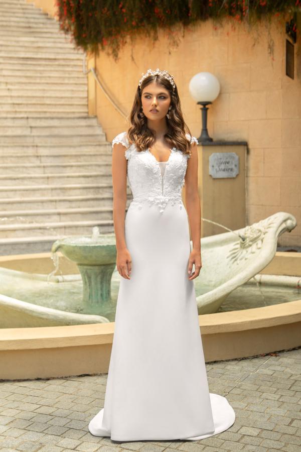 BLOSSOM-ROSE ML19603 DEEP PLUNGE BODICE WITH ILLUSION TULLE CAP SLEEVES AND ILLUSION BACK WITH BUTTONS FITTED CREPE SKIRT WEDDING DRESS MADI LANE BRIDAL