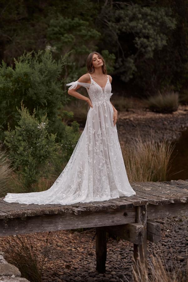 CALISSA-ML20084-FULL-LLENGTH-FLORAL-LACE-GOWN-WITH-DEEP-V-PLUNGE-NECKLINE-STRAPS-AND-DETACHABLE-OFF-SHOUDER-TULLE-SLEEVES-ILLUSION-BACK-AND-ZIPPER-CLOSURE-WEDDING-DRESS-MADI-LANE-BRIDAL-1